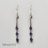 Natural Amethyst Gemstone Earrings Wire Wrapped in Sterling Silver (Oxidized) Material: Sterling Silver (Oxidized) Stones: Natural Amethyst Earring length: 51mm