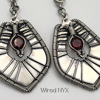 Natural Garnet Earrings Wire Wrapped in Sterling Silver (Oxidized) Material: Sterling Silver/Stainless Steel Chain (Oxidized) Stones: Natural Garnet Earring length: 58mm