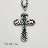 Green Opal Gemstone Wire Wrapped Cross Pendant in Sterling Silver (Oxidized) Material: Sterling Silver (Oxidized) Stones: Green Opal Pendant height: 36mm Pendant width: 23mm Chain: Stainless Steel Round Rolo Chain (3mm) ~ Choose Length 18"-30" Inches