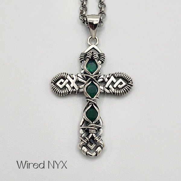 Green Opal Gemstone Wire Wrapped Cross Pendant in Sterling Silver (Oxidized) Material: Sterling Silver (Oxidized) Stones: Green Opal Pendant height: 36mm Pendant width: 23mm Chain: Stainless Steel Round Rolo Chain (3mm) ~ Choose Length 18"-30" Inches