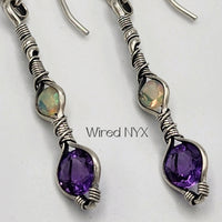 Natural Amethyst & Opal Earrings Wire Wrapped in Sterling Silver (Oxidized) Material: Sterling Silver (Oxidized) Stones: Natural Amethyst & Opal Earring length: 48mm